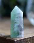 Rainbow fluorite tower with calcite snowflakes 9