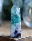 Rainbow fluorite tower with calcite snowflakes 12