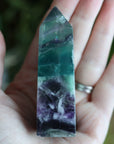 Rainbow fluorite tower with calcite snowflakes 12