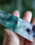 Rainbow fluorite tower with calcite snowflakes 12