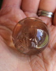 Smoky quartz sphere with rainbow inclusions 2, new