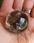 Smoky quartz sphere with rainbow inclusions 3, new