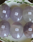 Yttrium lavender fluorite pocket stone