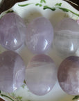 Yttrium lavender fluorite pocket stone