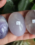 Lavender Yttrium fluorite pocket stone