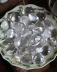 Medium high grade clear quartz tumbled stone