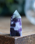 Rainbow fluorite tower with calcite snowflakes 7