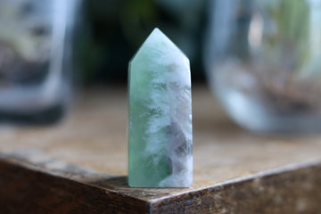 Rainbow fluorite tower with calcite snowflakes 9
