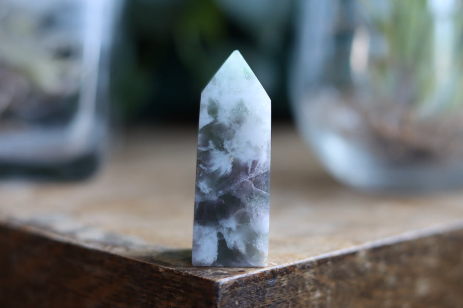 Rainbow fluorite tower with calcite snowflakes 9