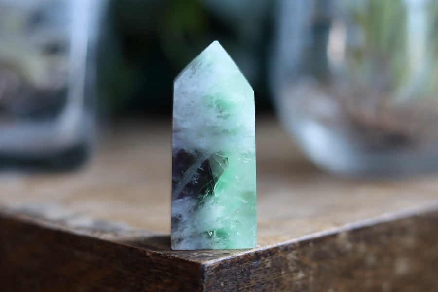 Rainbow fluorite tower with calcite snowflakes 9