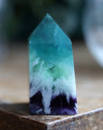 Rainbow fluorite tower with calcite snowflakes 10