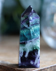 Rainbow fluorite tower with calcite snowflakes 11 new