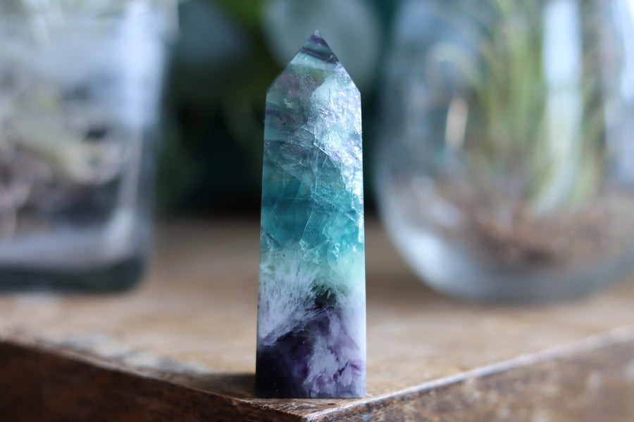 Rainbow fluorite tower with calcite snowflakes 12