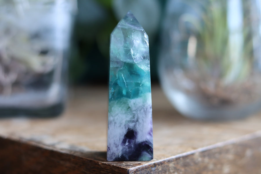 Rainbow fluorite tower with calcite snowflakes 12