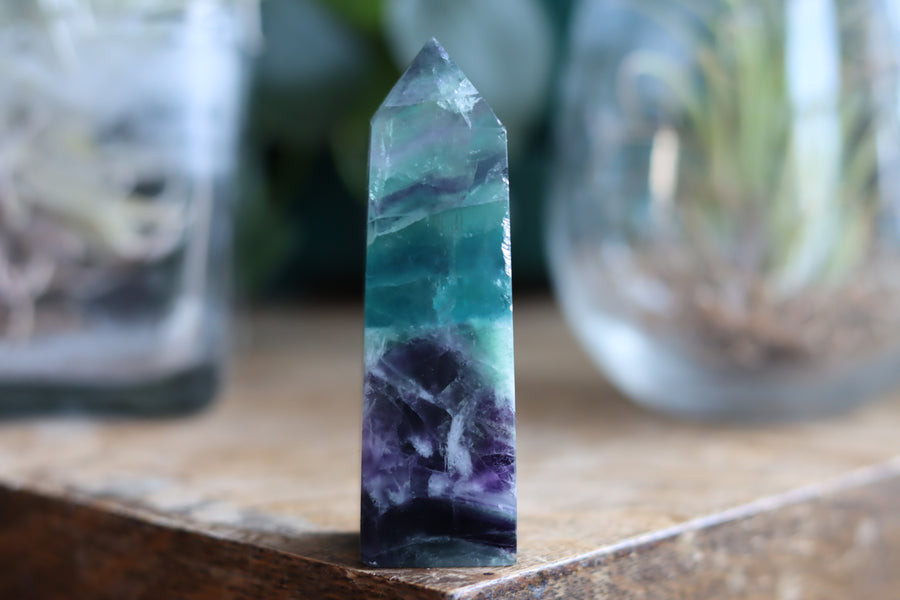 Rainbow fluorite tower with calcite snowflakes 12