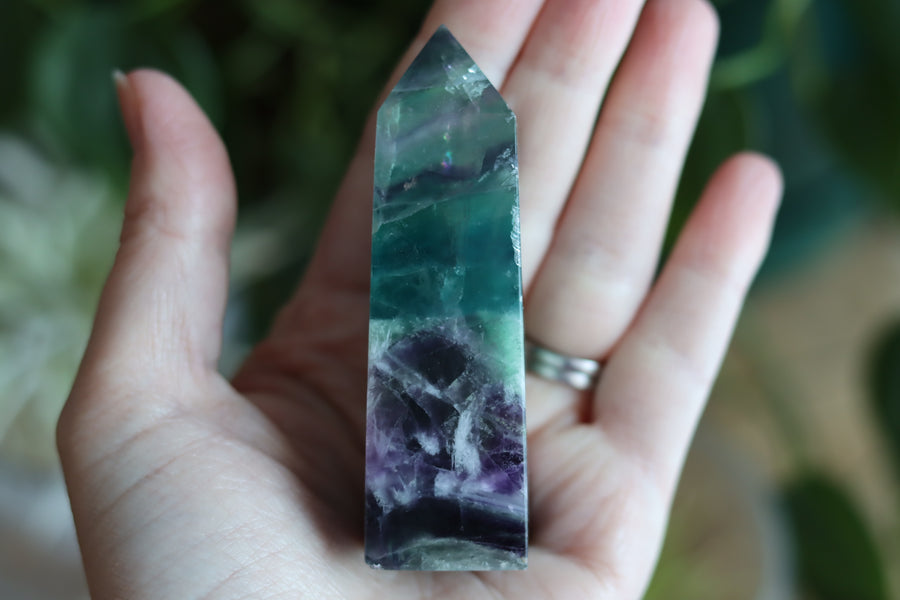 Rainbow fluorite tower with calcite snowflakes 12