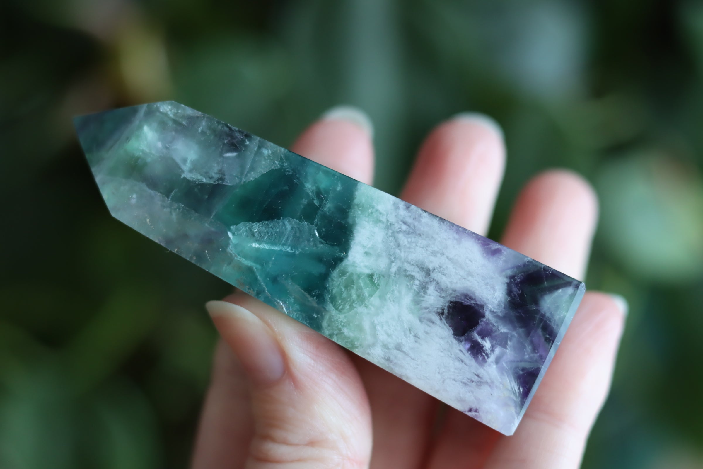 Rainbow fluorite tower with calcite snowflakes 12