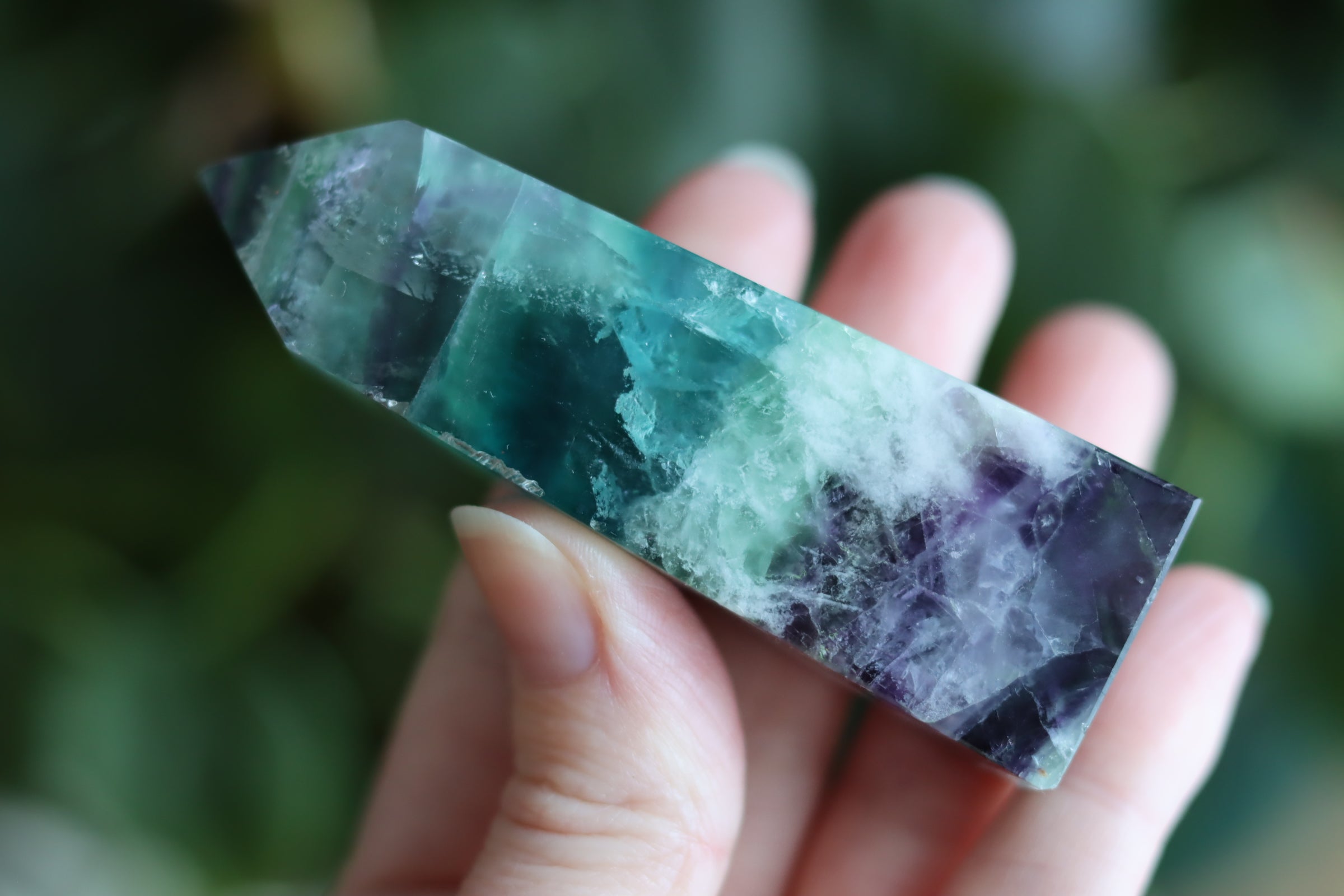 Rainbow fluorite tower with calcite snowflakes 12