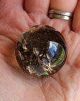Smoky quartz sphere with rainbow inclusions 1, new