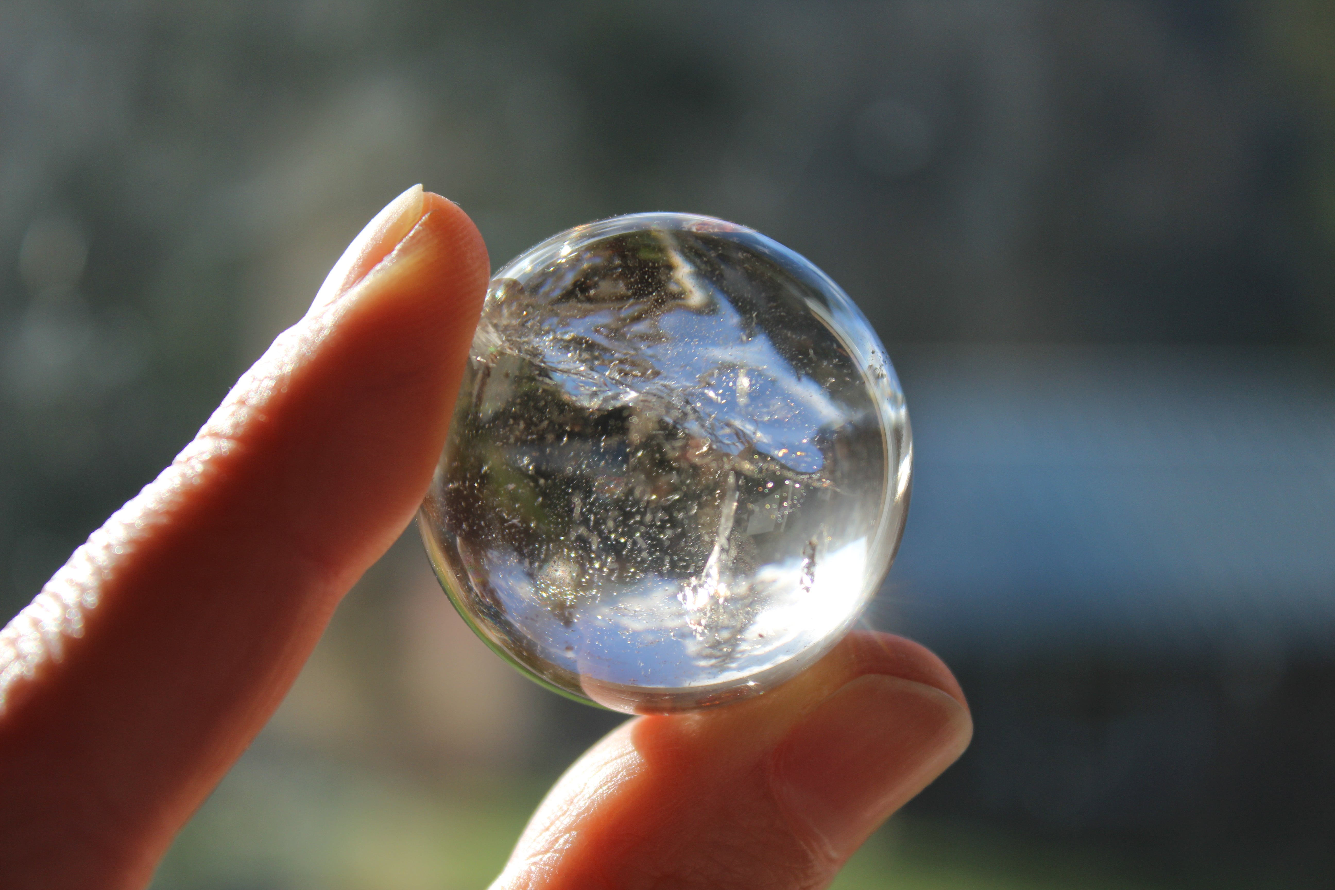 Smoky quartz sphere with rainbow inclusions 2, new