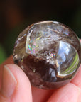 Smoky quartz sphere with rainbow inclusions 3, new