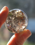 Smoky quartz sphere with rainbow inclusions 3, new