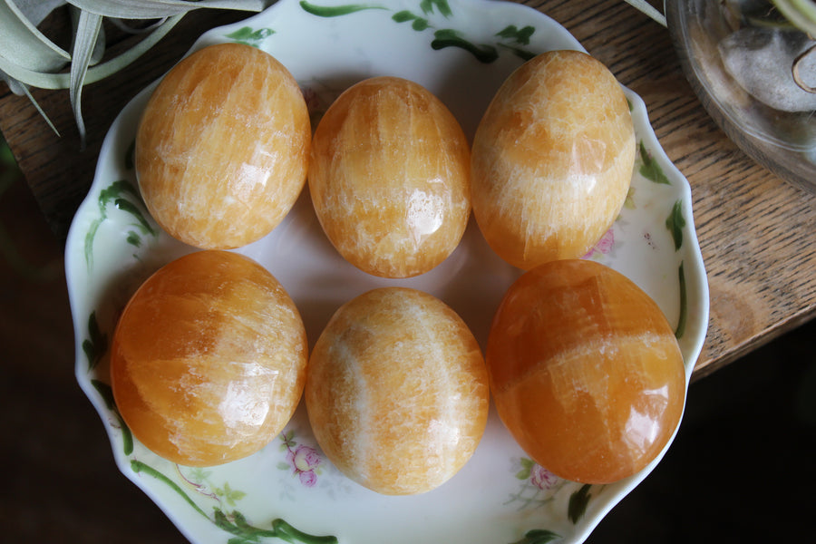 Orange calcite pocket stone