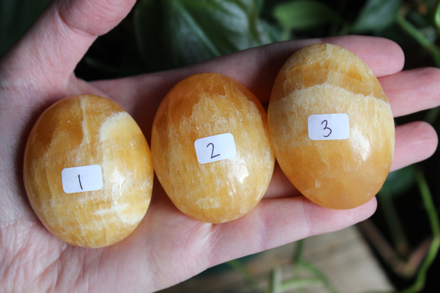 Orange calcite pocket stone