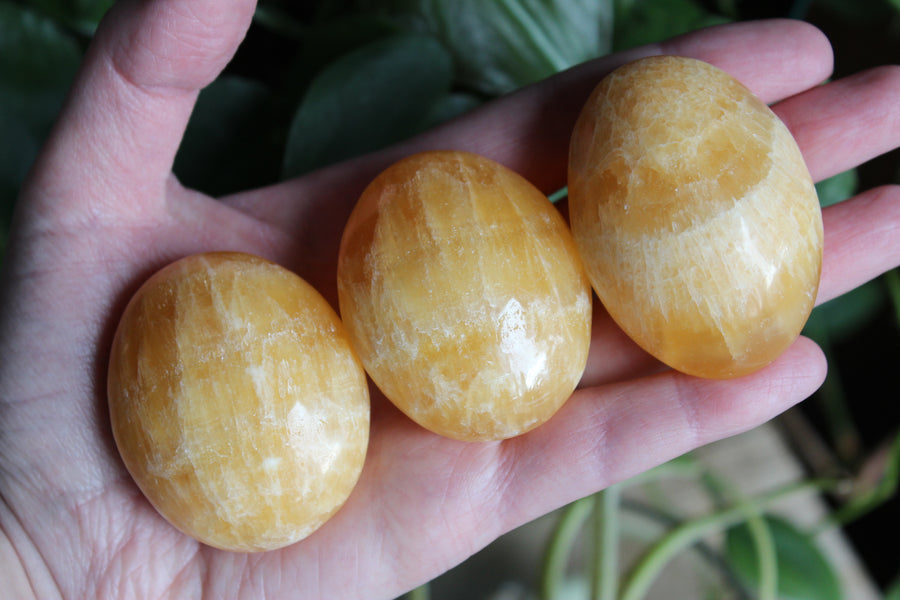 Orange calcite pocket stone