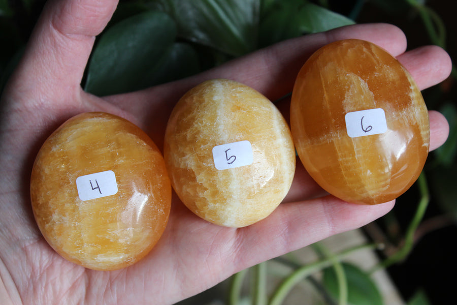 Orange calcite pocket stone